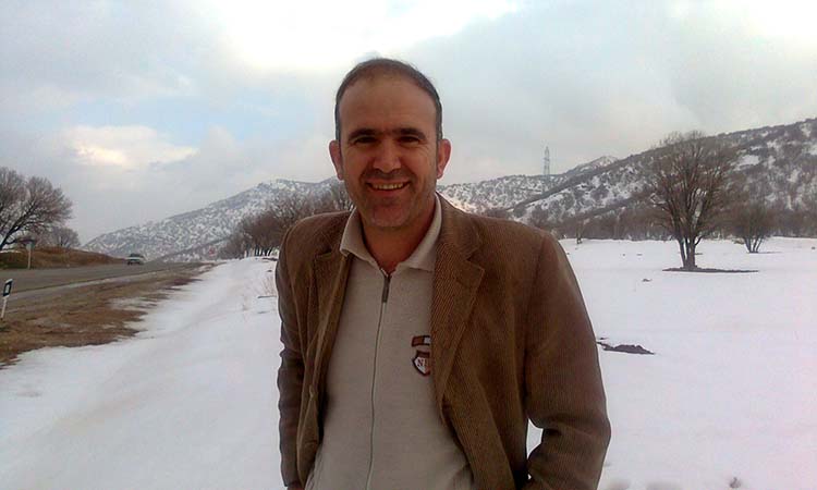 علیمحمد محمدی، شاعر و رئیس ستاد انتخاباتی حسن روحانی در شهر ایوان